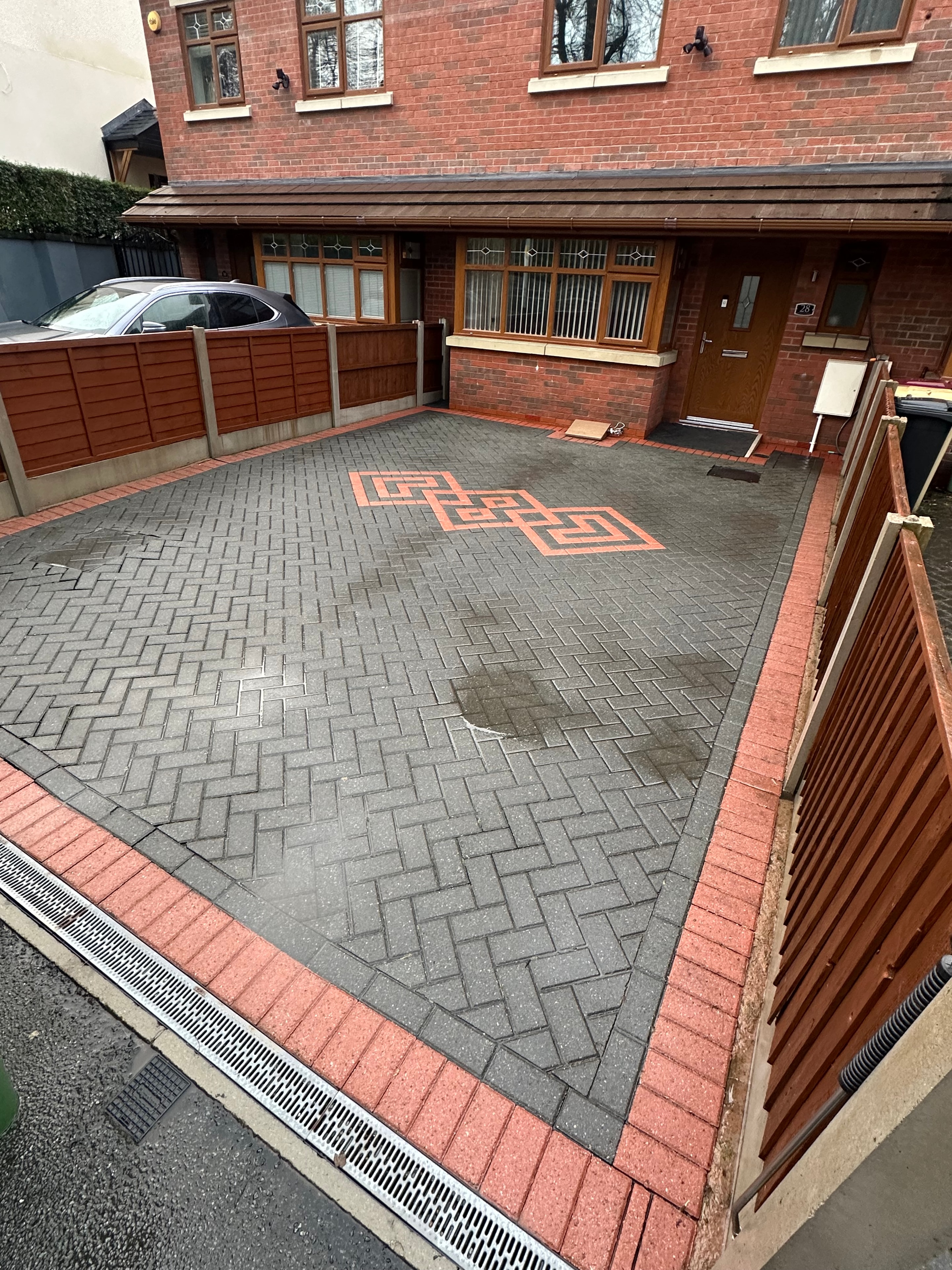 Northern Waters pressure washing — brick driveway